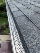dark installed along shingles